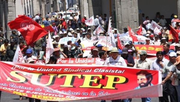 Workers marching in Peru