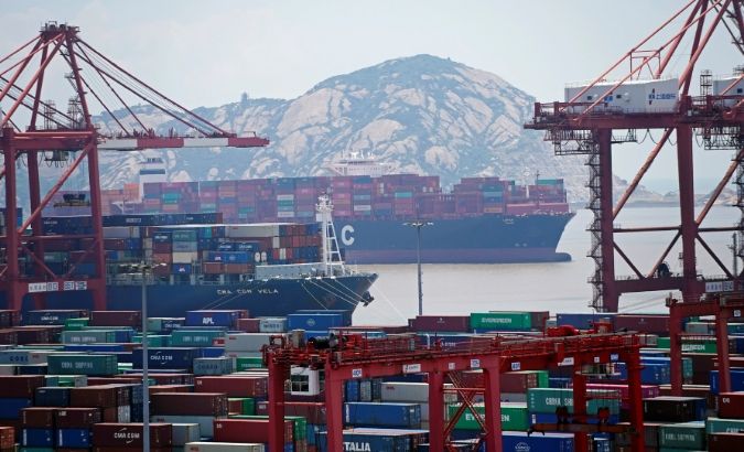 Containers are seen at the Yangshan Deep Water Port in Shanghai, China August 6, 2019.