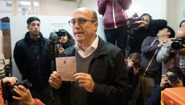 Frente Amplio (FA) candidate Daniel Martinez is leading the poll in Uruguay. 