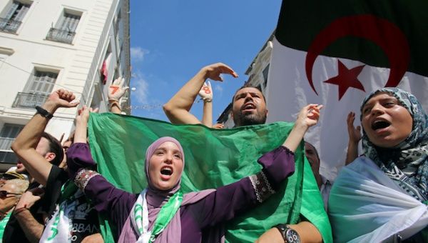 Demonstrators gesture and shout slogans during a protest demanding social and economic reforms, as well as the departure of the country's ruling elite in Algiers, Algeria, September 24, 2019.