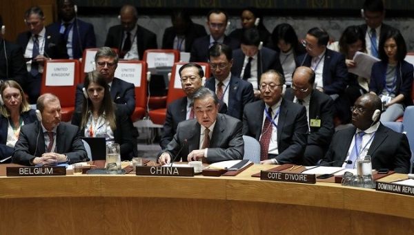 Chinese State Councilor and Foreign Minister Wang Yi (C, Front) addresses a UN Security Council ministerial debate on the cooperation between the United Nations and regional and subregional organizations in maintaining international peace and security at the UN headquarters in New York, on Sept. 25, 2019. 