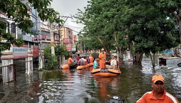 Rescue members evacuate people from a flood-affected neighbourhood in Patna, in the eastern state of Bihar, India, October 1, 2019.