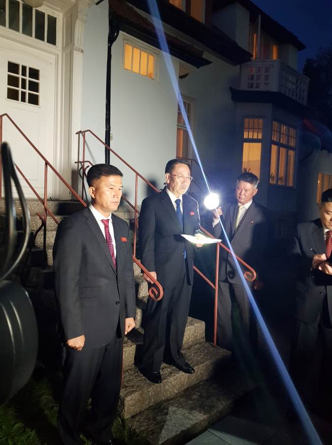 North Korea's chief nuclear negotiator Kim Myong Gil is seen outside the North Korean embassy in Stockholm
