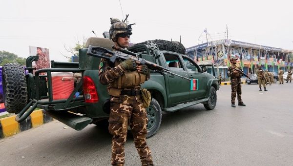 Afghan security forces keep watch during the presidential election in Jalalabad, Afghanistan Sept. 28, 2019. 