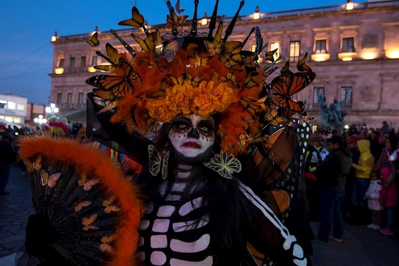 Woman participates in the night events of the Desert Souls parade in Saltillo city, Coahuila, Mexico, Oct. 31, 2019.