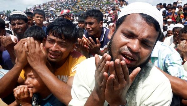 Rohingya refugees pray at a gathering mark the second anniversary of their exodus from Myanmar, at the Kutupalong camp in Cox’s Bazar, Bangladesh, August 25, 2019.