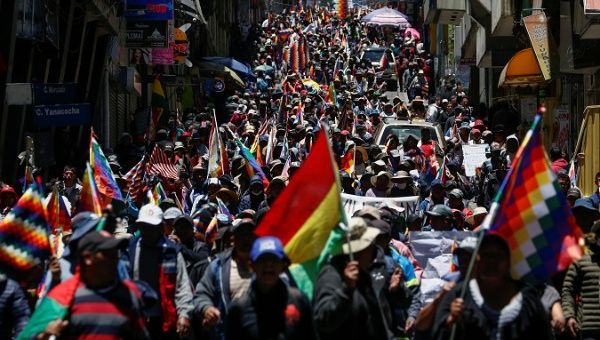 Supporters of Bolivian President Evo Morales march in La Paz, Cochabamba, Oruro and other localities in Bolivia, November 18, 2019.