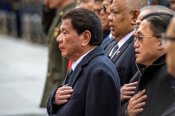 Philippine President Rodrigo Duterte attends a wreath laying ceremony at the Tomb of the Unknown Soldier in Moscow