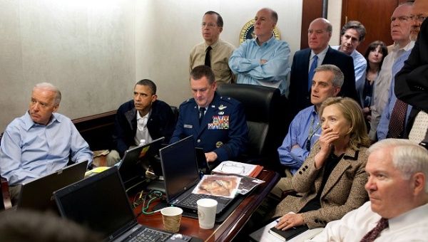 U.S. President Barack Obama (2nd L) and Vice President Joe Biden (L), along with members of the national security team, receive an update on the mission against Osama bin Laden in the Situation Room of the White House, Washington, U.S., May 1, 2011. Also pictured are Secretary of State Hillary Clinton (2nd R) and Defense Secretary Robert Gates (R).