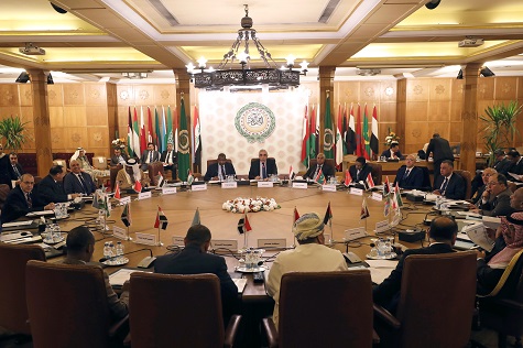 Permanent representatives of the Arab League take part in an emergency meeting at the League's headquarters in Cairo.