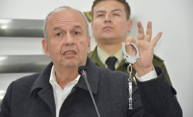 Interior Minister Arturo Murillo shows shackles while mentioning former President Morales, La Paz, Bolivia, January 8, 2020.