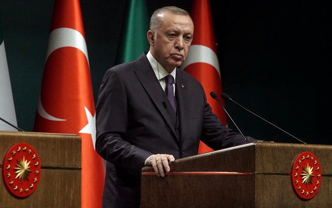 Turkish President Tayyip Erdogan reacts during a news conference in Ankara, Turkey January 13, 2020.