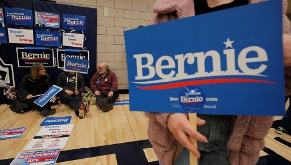 Supporters of Democratic 2020 U.S. presidential candidate Sanders wait at their caucus site in Des Moines.
