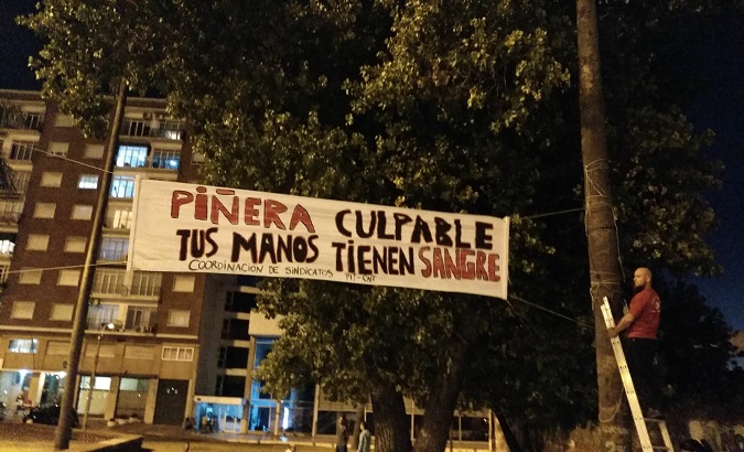 Hundreds of protesters take to the streets of Montevideo, Uruguay, to repudiate the presence of Sebastian Piñera in the country.