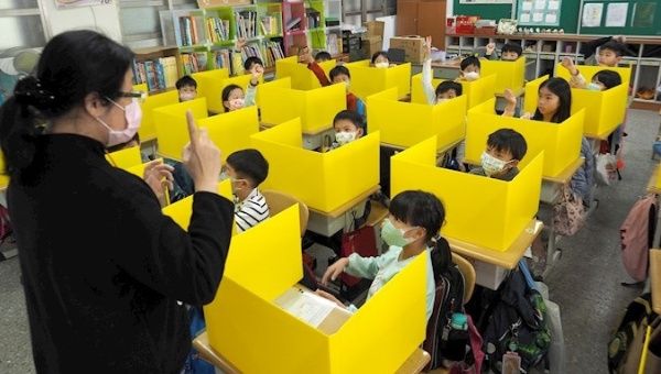 Students in a classroom prepared to prevent the Covid-19 spread, Taipei, Taiwan, March 6, 2020.