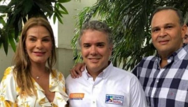 Photograph that includes current Colombia's President Ivan Duque (C) and international drug dealer Jose Hernandez (R).