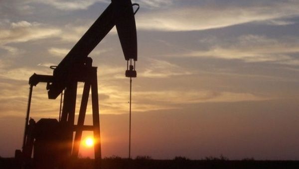 An oil pump in operation at dawn near Midland, Texas, U.S., April, 2020. 