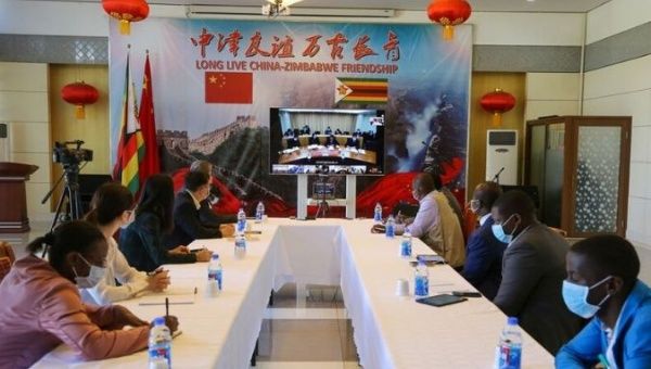 Senior officials from Zimbabwe's Ministry of Health and Harare City Council participate in the China-Africa Video Conference on COVID-19 in Zimbabwe. March 18, 2020