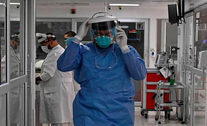 Doctor walking through a hospital, Bogota, Colombia, April 17, 2020.