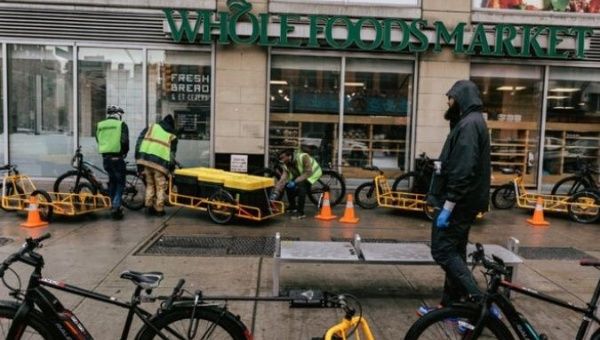 Workers protest at Instacart, Amazon and Whole Foods, seeking health protections and hazard pay.
