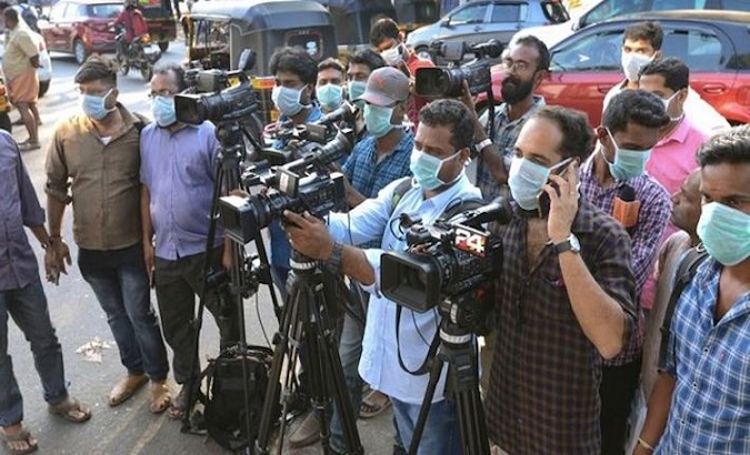 Journalists reporting from public spaces, Delhi, India. April 22nd.