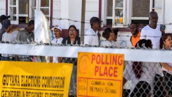 People waiting for their turn to vote, Georgetown, Guyana, March 2, 2020.