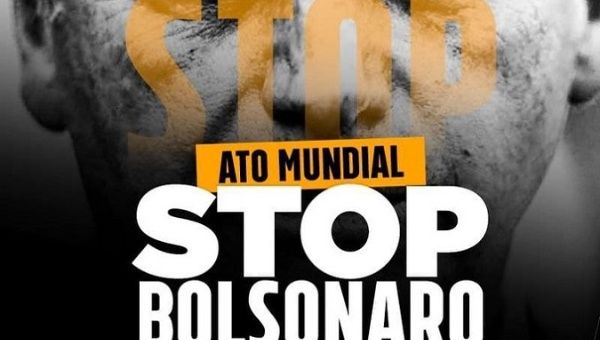 #StopBolsonaro poster with Jair Bolsonaro's image in the background.