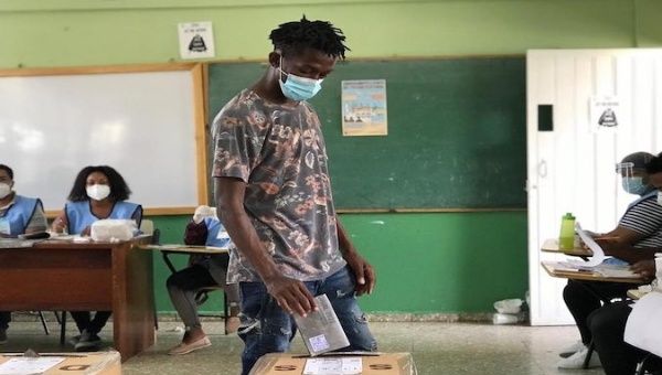 A young man participates in the Dominican Republic's elections in Santo Domingo, July 5, 2020.