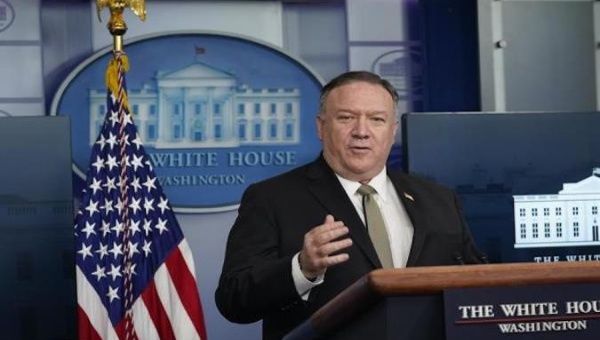U.S. Secretary of State Mike Pompeo participates in a news briefing at the White House, Washington, April 8, 2020. 