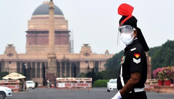 Military Police wearing a face shield stands guard outside the Indian Presidential House in New Delhi, India, July, 24 2020