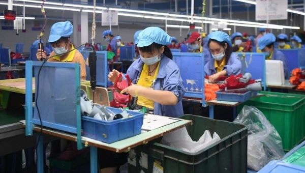 Workers make toys at a factory in Hunan, China, May 27, 2020.