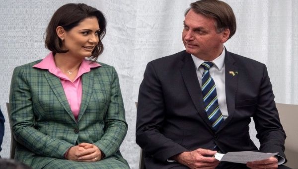 President Jair Bolsonaro and his wife Michelle speak during a meeting, Miami, U.S. March 9, 2020. ,  