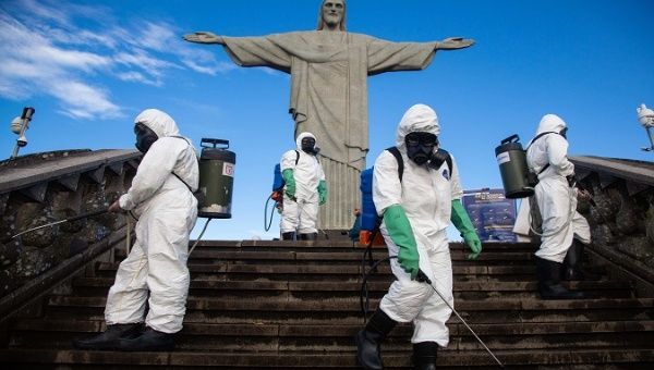 Brazilian army soldiers  sanitize the Redeemer Christ  for its reopening. Rio de Janeiro, Brazil. August 13, 2020.