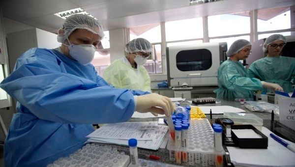 Scientists works in a laboratory in Sao Paulo, Brazil, June 17, 2020.