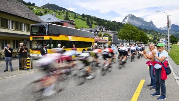 A group of cyclists rides in Nesslau, Switzerland, June 18, 2019.