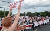 Belarusians attend a rally against the results of the Belarusian presidential election in Minsk, Belarus, 14 August 2020.