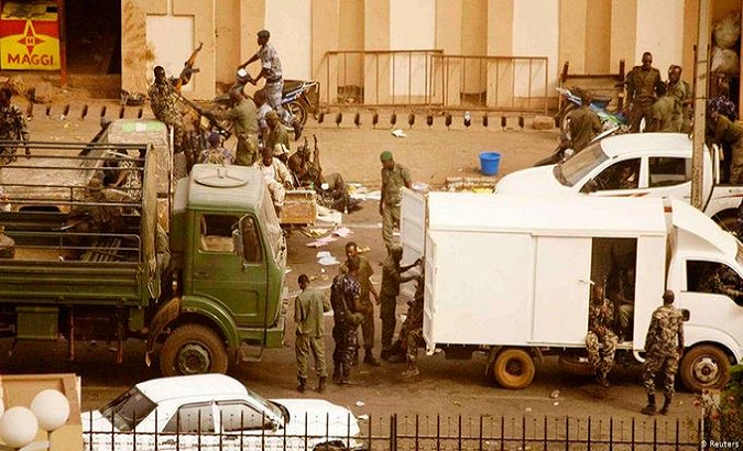 Rebels outside the ORTM television station in Bamako, Mali, August 18, 2020.
