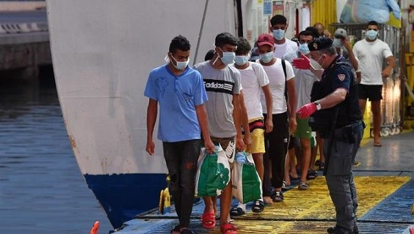 The ferry carrying 200 migrants from Lampedusa arrives in Empedocle, Italy, July 28, 2020.
