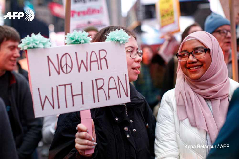 Anti-war activists protest in Times Square in New York, U.S., January 4, 2020