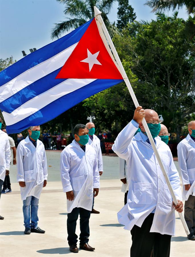 Members of Cuba's Henry Reeve international medical brigade participate in a ceremony before leaving for the Italian region of Piedmont. Havana, Cuba. April 12, 2020.