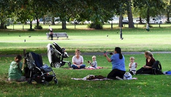 Mothers and their children at a park in London, England, Sep. 10, 2020.