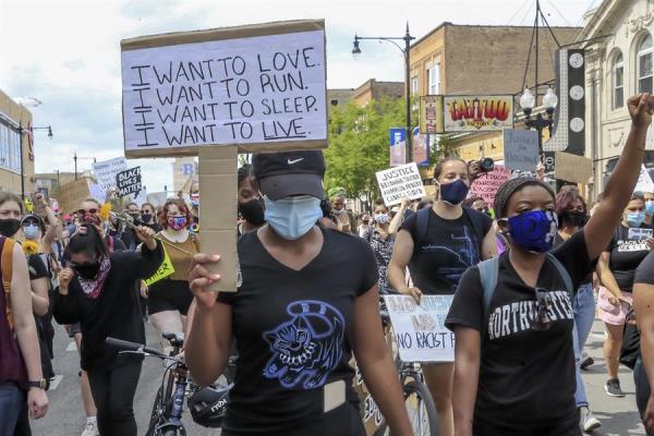 Racial justice demonstrators protest over the deaths of Breonna Taylor and George Floyd in the Uptown neighborhood of Chicago, Illinois, USA. June 05, 2020.