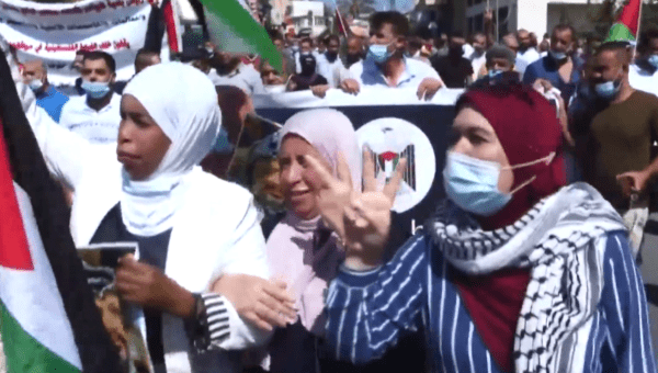 Palestinians demonstrate in the West Bank city of Tuba. September 27, 2020.