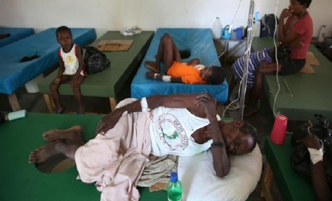 Patients with symptoms of cholera receive medical care in Port au Prince, Haiti, Oct. 9, 2020.