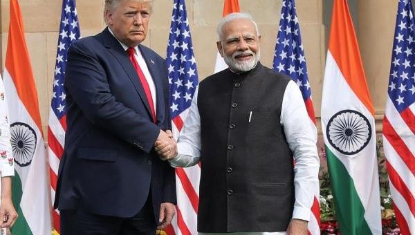 Indian Prime Minister Narendra Modi (R) and US President Donald J. Trump (L) shake hands prior to a meeting at Hyderabad House in New Delhi, India. February 25, 2020. 