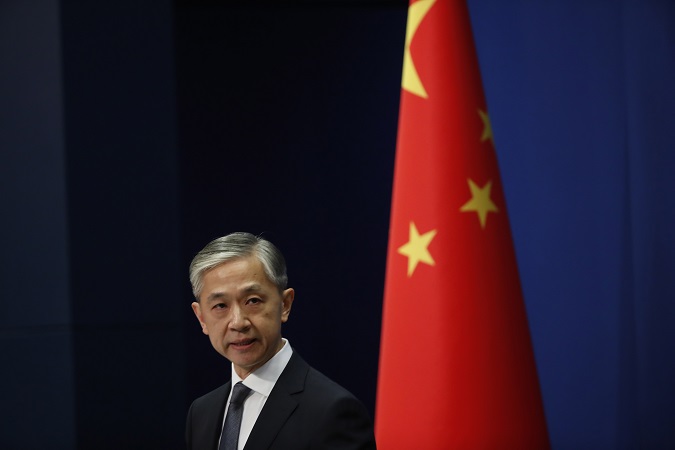 Chinese Foreign Ministry spokesman Wang Wenbin speaks during a daily media briefing at the Ministry of Foreign Affairs in Beijing, China, 18 September 2020