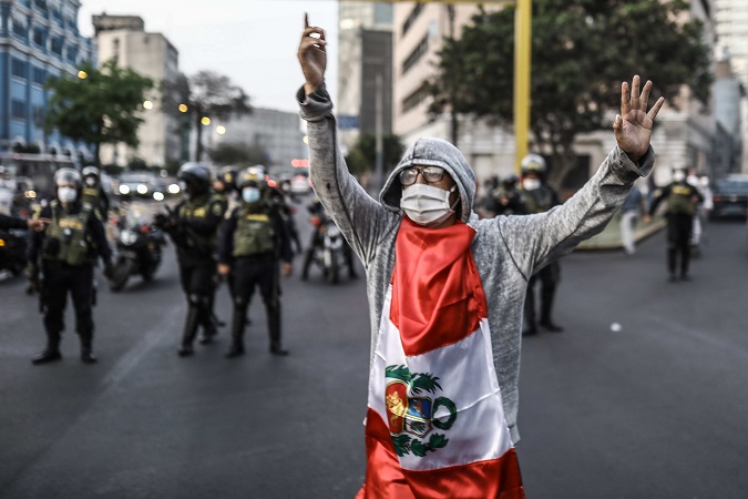 A person protests against Manuel Merino today in Lima, Peru. As citizen protests since last Monday night have shown, a large part of Peruvians reject the fact that the President of Congress, Manuel Merino, has assumed the nation´s presidency and demand that Martin Vizcarra be reinstated in office and finish his mandate.