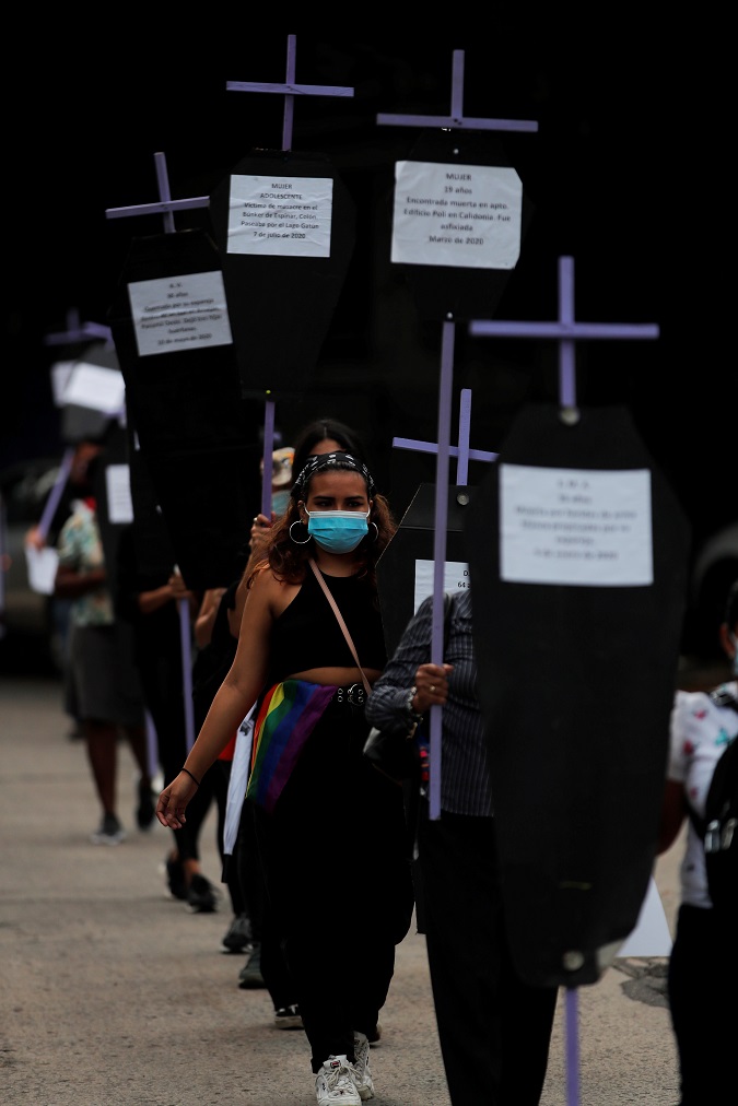 Women march with crosses during a demonstration on the occasion of the International Day for the Elimination of Violence against Women today, in Panama City (Panama).