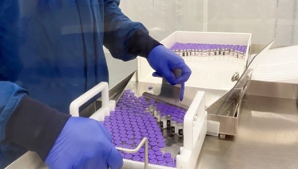 The pharmaceutical company Pfizer shows vials of Covid-19 vaccine in an undisclosed laboratory on16 November 2020.