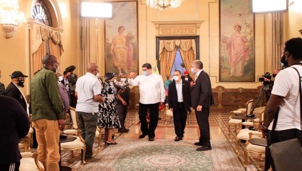 President Nicolas Maduro (C) meets African observers, Caracas, Venezuela, Dec. 5, 2020